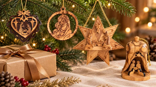 Olive wood Christian Christmas ornaments featuring the Holy Family heart, Mother Mary with Baby Jesus, Star of Bethlehem and Nativity bell.