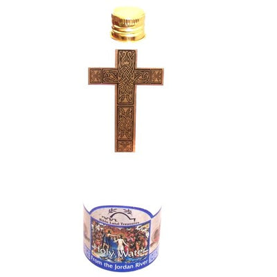 Holy water form the Jordan River in a Cross shaped Bottle