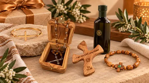 Christian gifts for women featuring a cross bracelet, olive wood rosary, anointing oil, comfort cross, and wooden cross bracelet.