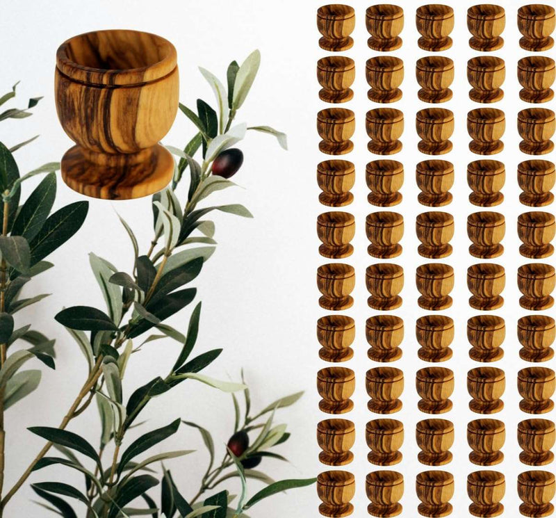 Fifty olive wood communion cups arranged in ten rows of five