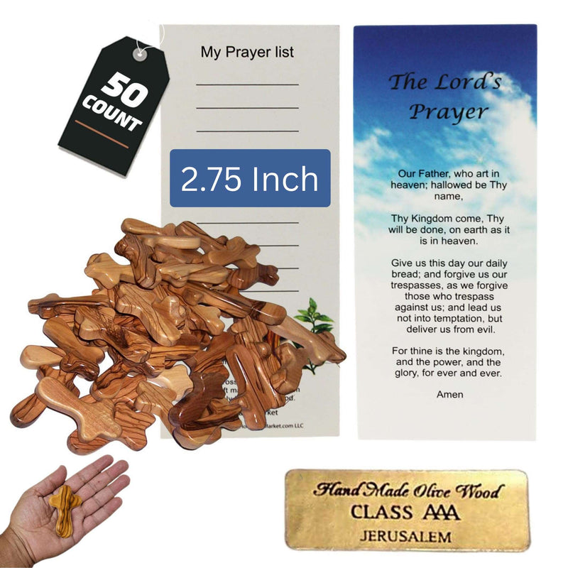 Pile of fifty olive wood pocket crosses with prayer cards and gold plaque