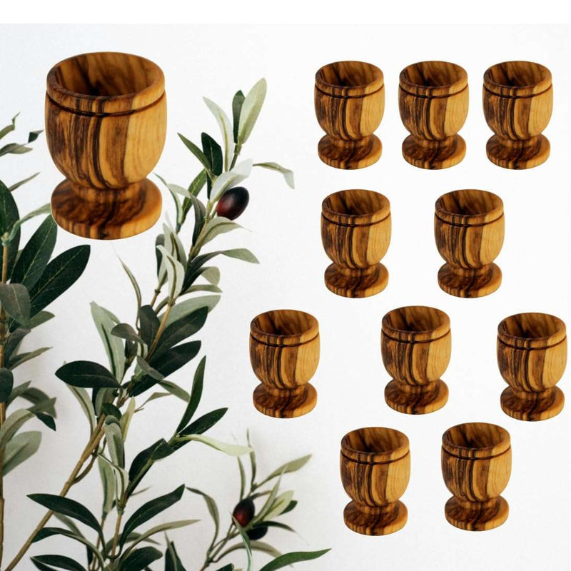 Ten olive wood communion cups arranged in a grid with an olive branch