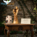 Holy Land Market Hand-Carved Bethlehem Olive Wood Holy Family Heart Sculpture – by Christian Artisans – with a Certificate of Authenticity, Prayer Card, and Nativity Pectoral Booklet - 5 Inches