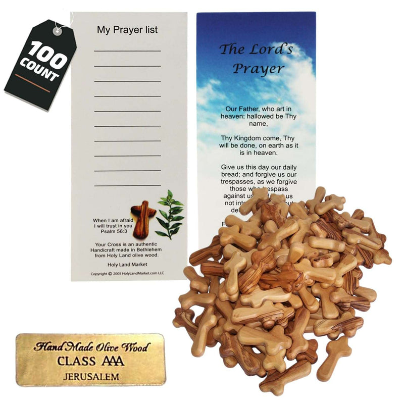 Mound of one hundred olive wood crosses with prayer cards