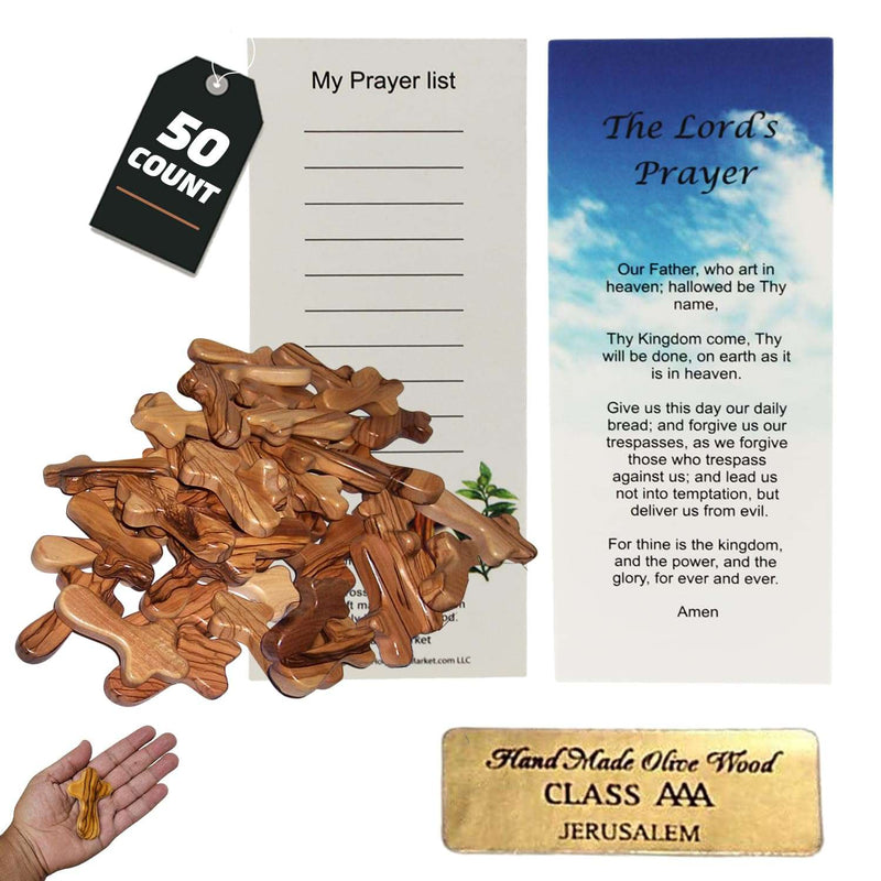 Pile of fifty olive wood holding crosses beside prayer list card