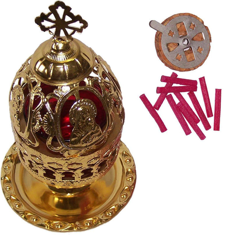 Ovoid brass filigree lamp with icon medallions, cross finial and red glass insert