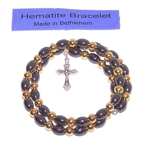 Expandable wired Hematite religious bracelet with Silver tone Crucifix and gold metal beads